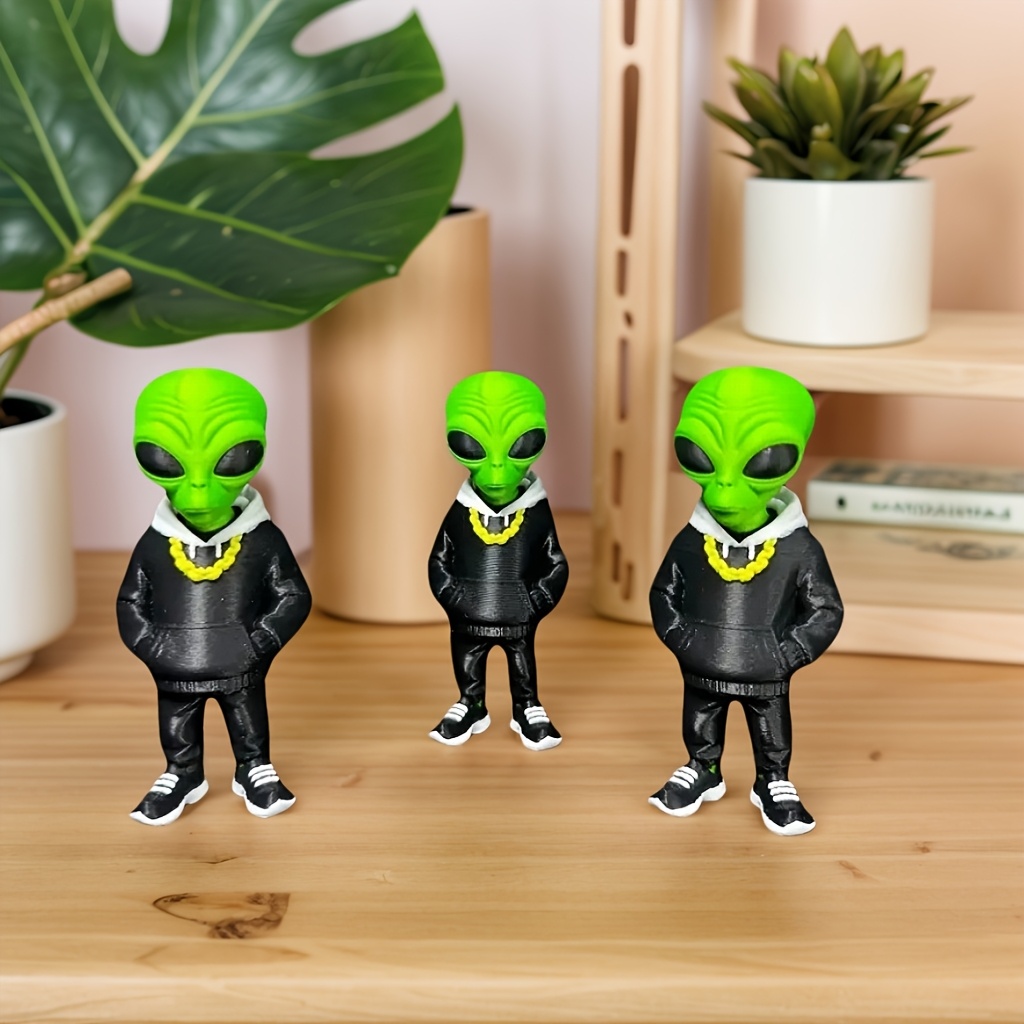 1 figurine d'alien verte avec  - Desk Setup Home avis et prix