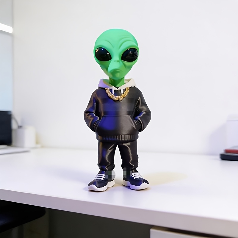 1 figurine d'alien verte avec  - Desk Setup Home avis et prix